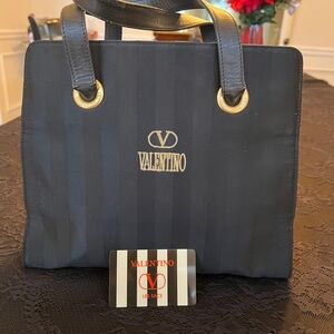 Valentino Garavani Black Shoulder Bag with Gold Accents